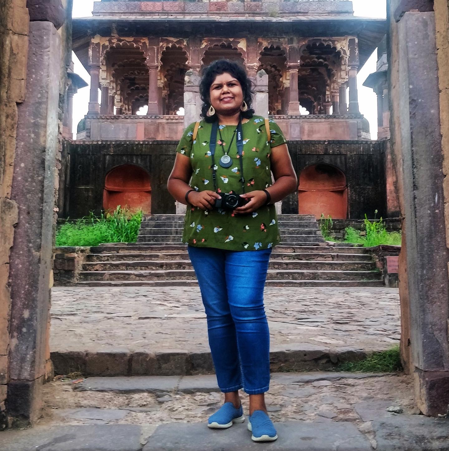 Chittra M with her camera at a heritage monument